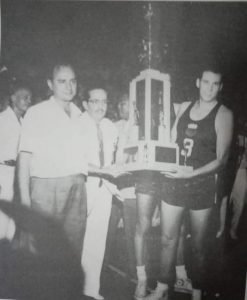 Team skipper Carlos Loyzaga, with coach Arturo Rius and Yco owner Don Manolo Elizalde beside him, holds the championship hardware after the Philippines topped the inaugural ABC tournament in Manila in 1960 with a 9-0 record and an average winning margin of 29.4 points a game. [Henry Liao photo]