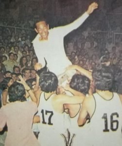Valentin (Tito) Eduque, well known for his immaculate white wardrobes, gets the victory ride after piloting the Mariwasa Akai Recorders to their first-ever MICAA All-Filipino crown in 1973.