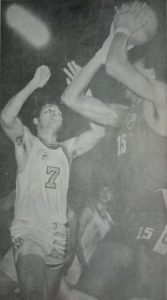 Jaworski, here donning the Meralco colors, defends against Yco import Charles Walker in MICAA action. Jaworski, a former Painter, led the Reddy Kilowatts to the MICAA Open crown in 1971.