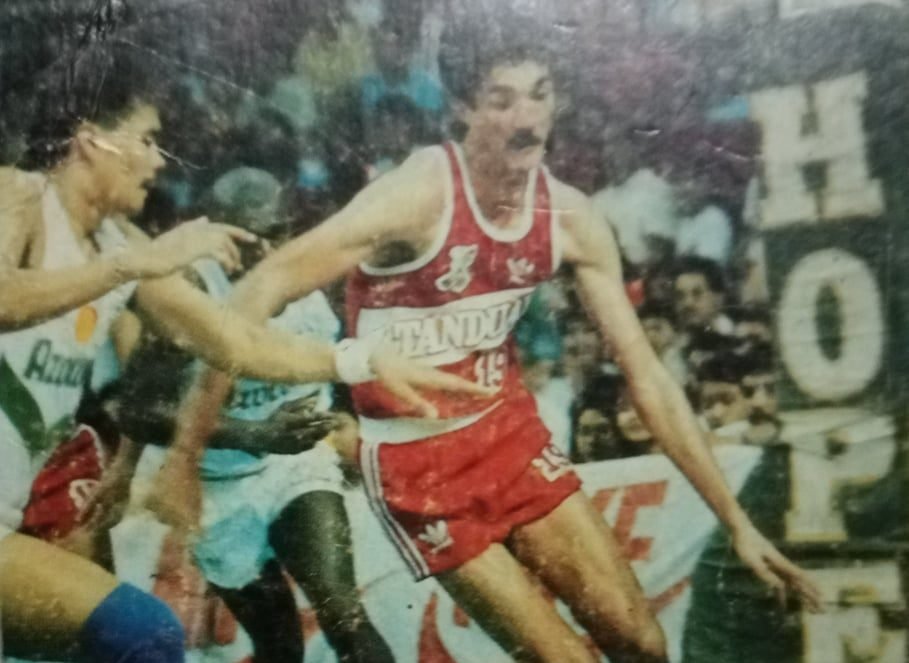 Fernandez navigates around his defender while donning the Tanduay colors.