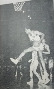 Defensive demon Tom Cowart ferociously grabs a rebound in MICAA action. He and Paul Scranton were the first import acquisitions of Crispa-Floro in the late 1960s.