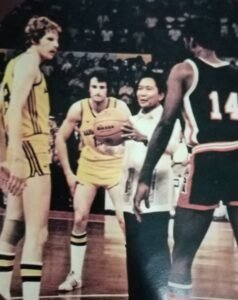 President Marcos tosses the ceremonial ball to usher in the 1978 World Basketball Championship at the Araneta Coliseum. It was less than half-filled as only around 10,000 spectators showed up at the 22, 000-seat Big Dome.