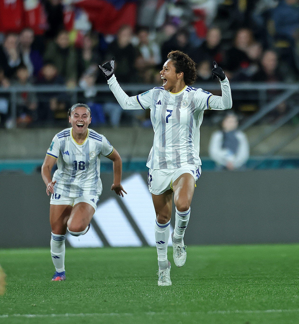 Sarina Bolden exults after scoring the winning header against New Zealand. Joining her in the celebration is teammate Sofia Harrision. [contributed photo]