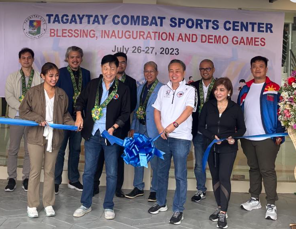 PHILIPPINE Olympic Committee President Rep. Abraham “Bambol” Tolentino (front, third from left) and Philippine Sports Commission Commissioner Edward Hayco (front, second from left) lead the ribbon-cutting ceremony with (front, from left) Cavite Vice Governor Athena Tolentino and Tagaytay City Vice Mayor Agnes Tolentino, DMD, as well as combat sports officials (rear, from left) Alvin Aguilar (president, wrestling), Jose Malonzo (secretary-general, Vovinam), Alexander Sulit (president, judo), Tongson Rene (secretary-general, arnis), Ferdie Agustin (president, jiu-jitsu) and Atty. Wharton Chan (secretary-general, kickboxing).