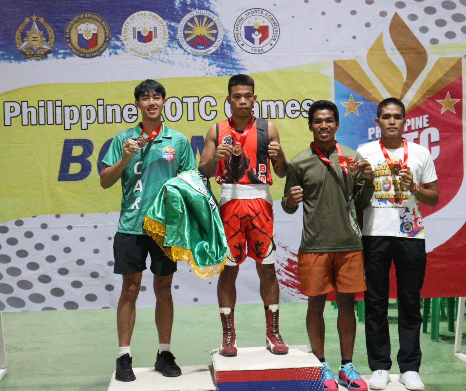 (L-R) In Light Welterweight 60 - 63.5 Kg, Silver - Raffy Chagsan University of Baguio, Gold Benie Tabaco-An University of Antique, Bronze John Loid Lorenzo Makilala Institute of Science and Technology Bronze Jobert Caramihan STI West Negros University