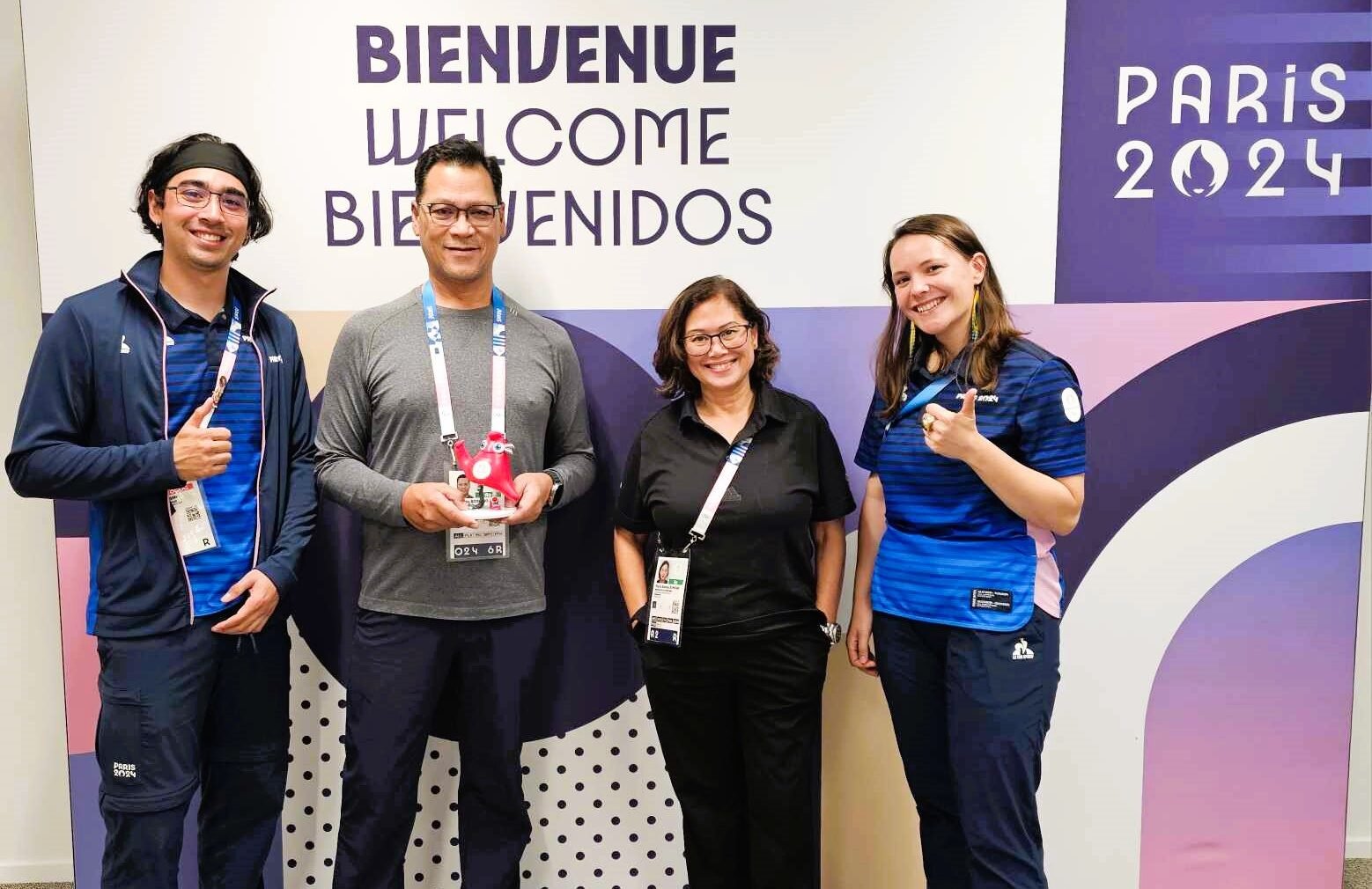 Philippine Paralympic team chef de mission Ral Rosario (second from left) and Philippine Paralympic Committee director for sports development Milette Santiago-Bonoan (third from left) pose for posterity after attending the foreign delegation registration meeting.