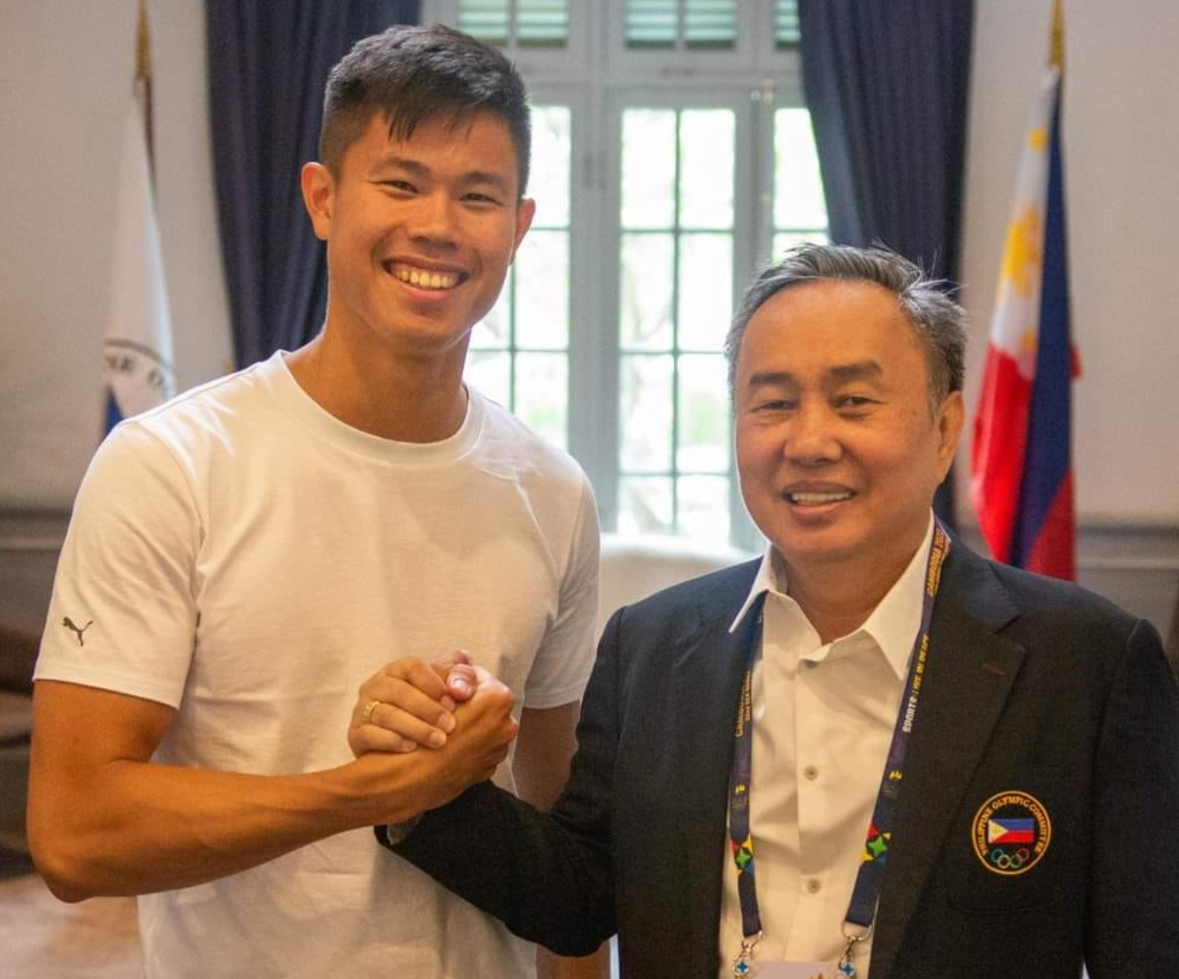 EJ Obiena with POC President Abraham "Bambol" Tolentino.