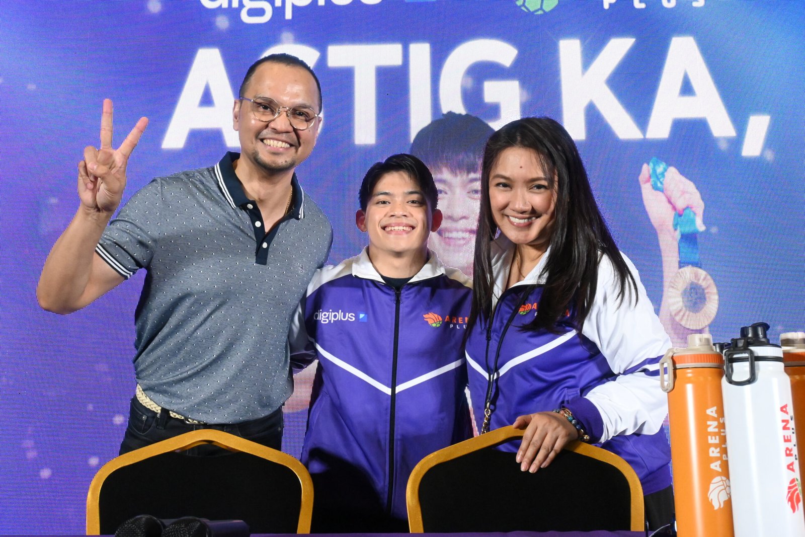 Left to right: Insight 360 President Christopher Cahilig, double gold medalist Carlos Yulo, and Yulo’s manager Khai Liclican celebrating the Olympian’s victory at the DigiPlus Astig Ka, Carlos! press conference.