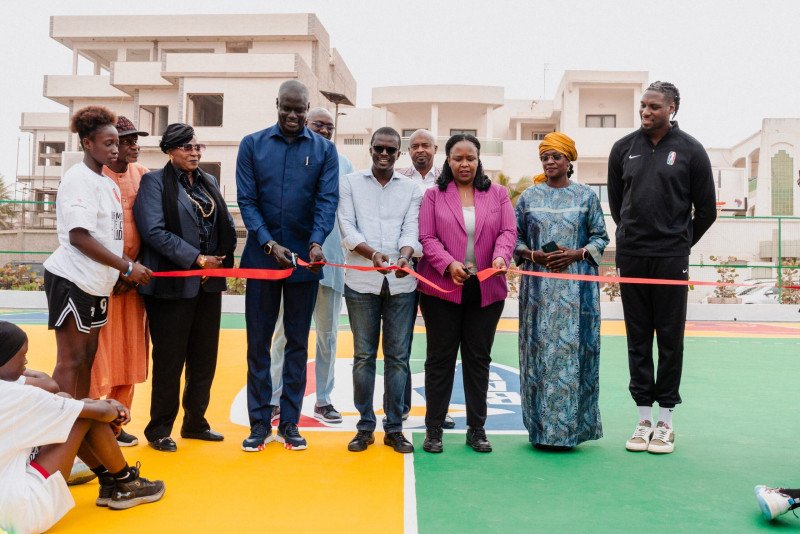 BAL President Amadou Gallo Fall and NBA Africa CEO Clare Akamanzi join Dakar officials for the ribbon cutting.