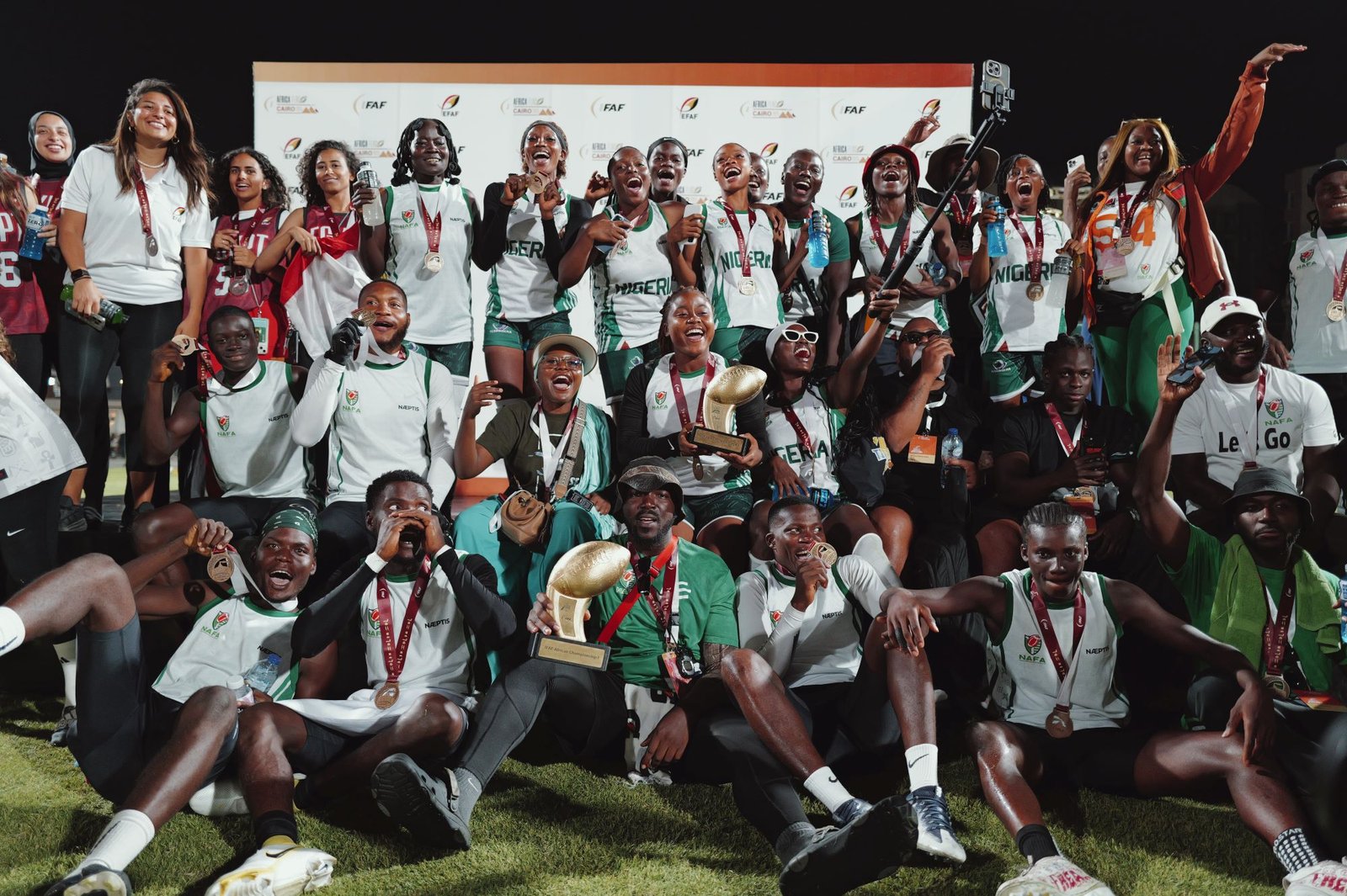 Nigeria’s women’s team celebrate after clinching gold over Morocco. [photo credit: IFAF]