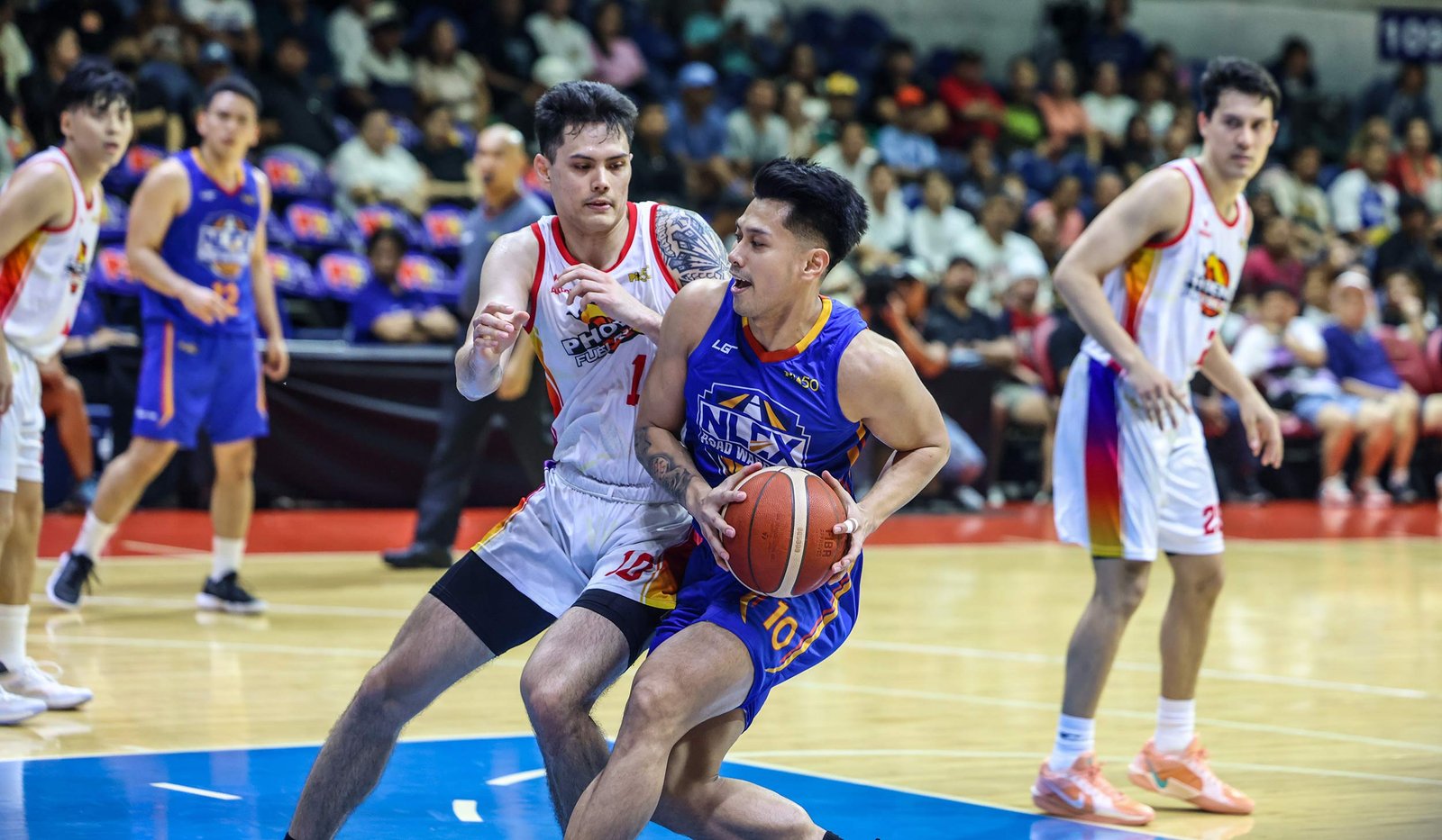 Javee Mocon powers through defenders during his 23-point outing vs. Phoenix. [PBA Images]