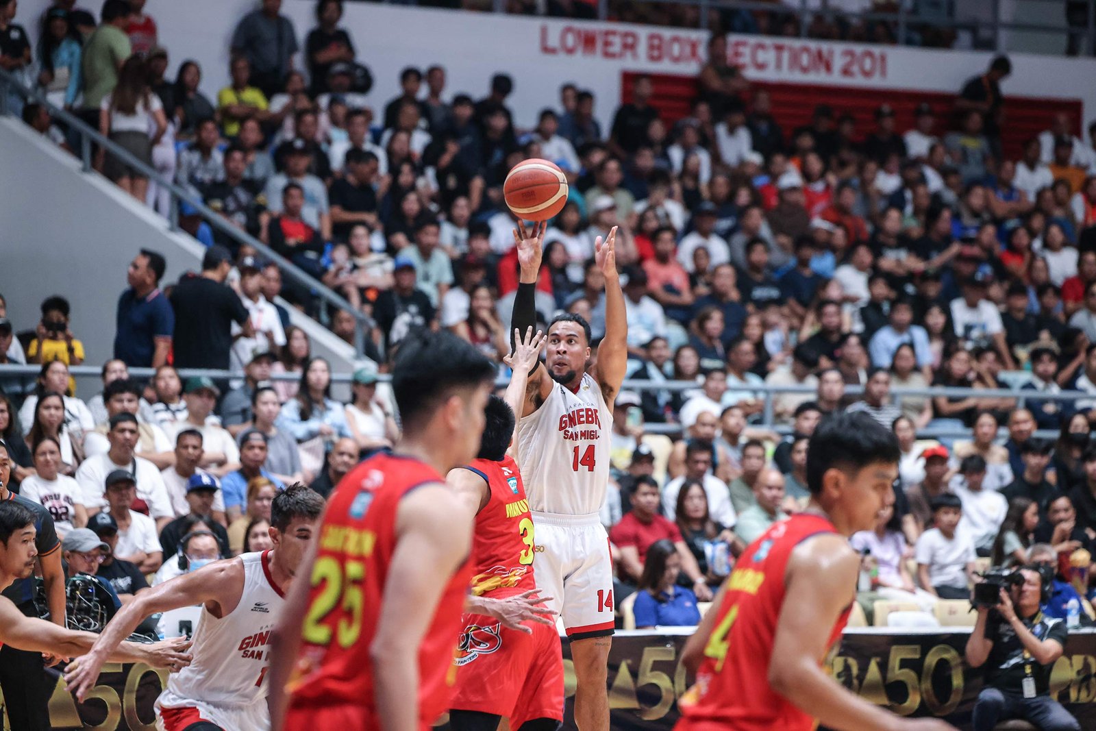 Stephen Holt fires off a shot in Ginebra’s matchup with Rain or Shine on June 15, 2025. [PBA Images]