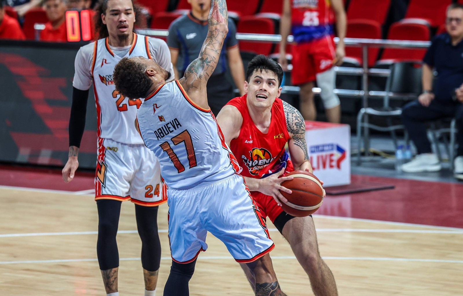 Kai Ballungay battles in the paint against NorthPort defenders. [PBA Images]