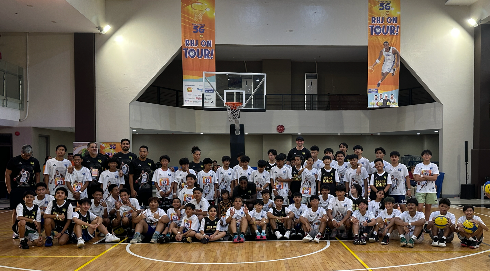 TNT Tropang 5G coaches unite for a common goal—youth development.