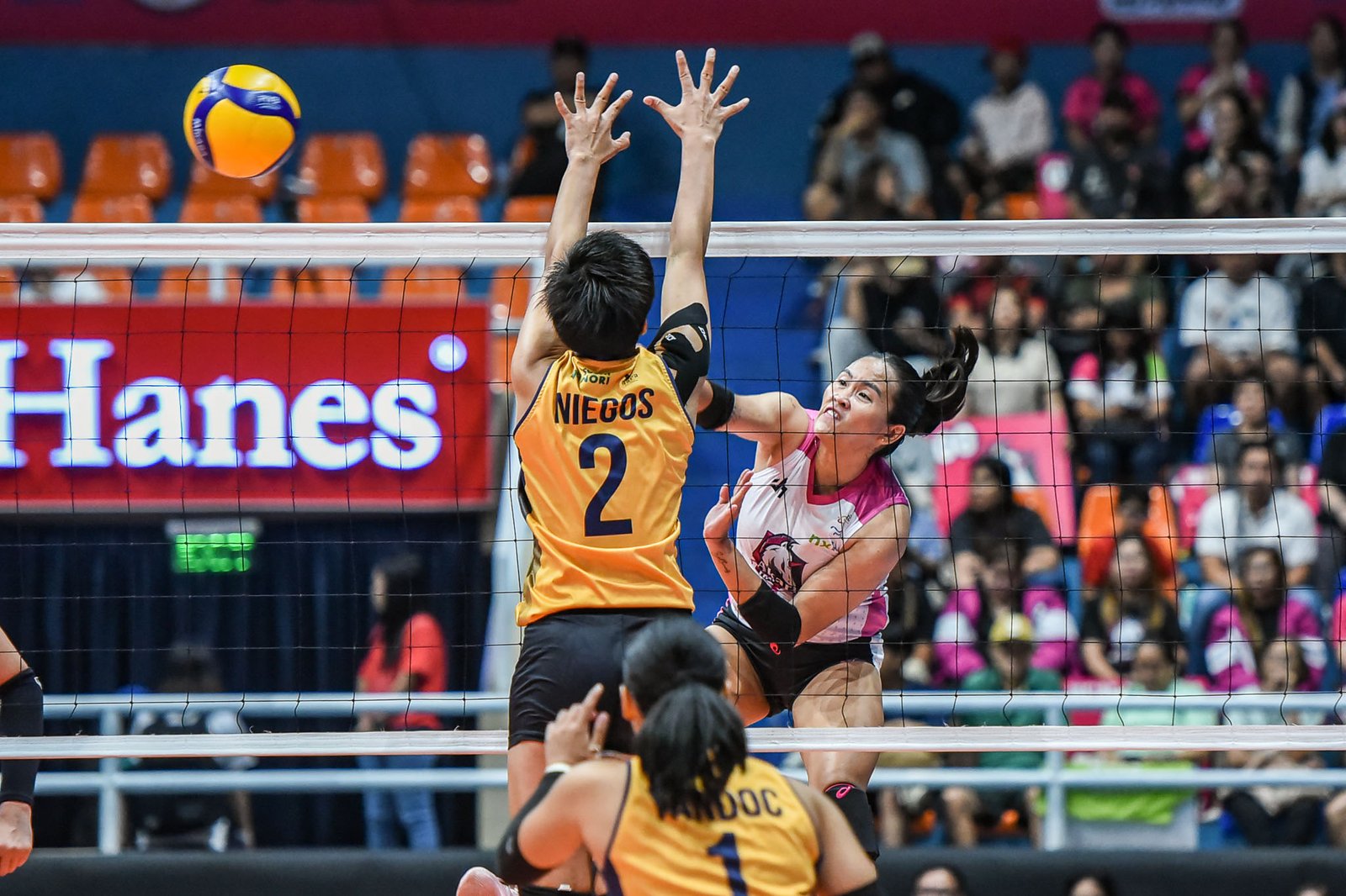 Grethcel Soltones and Dani Ravena combine on defense to help close out Capital1 [PVL Images]