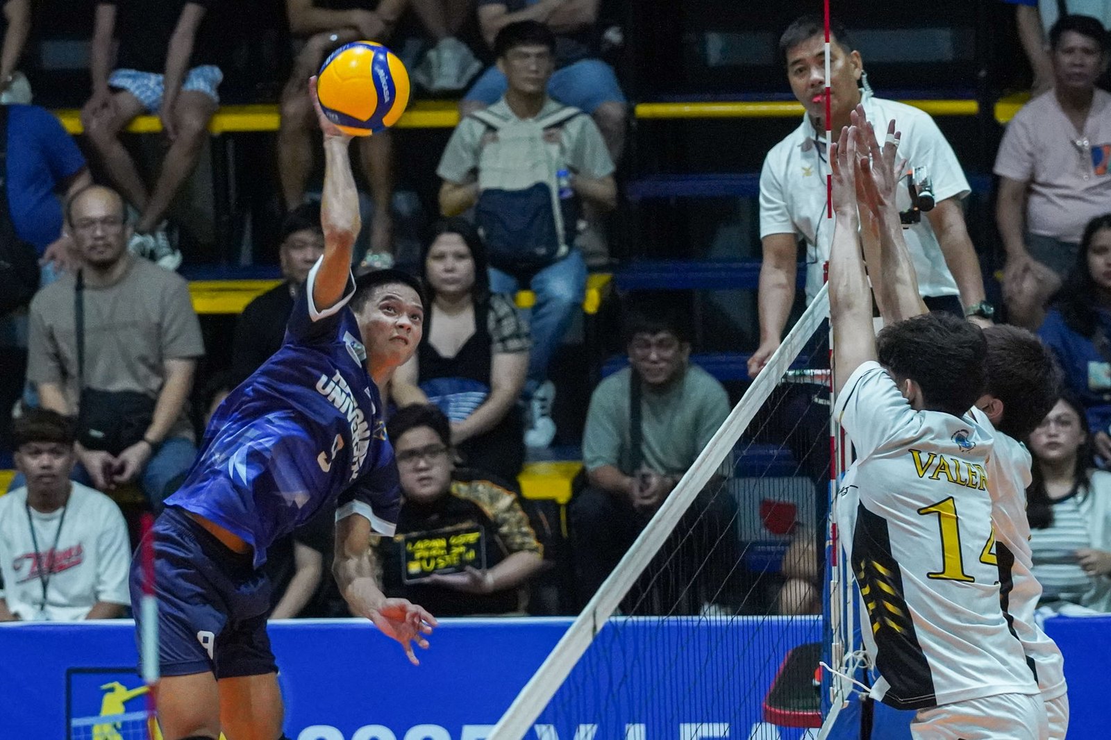 Rookie Yuan Mendoza delivers a breakout performance with 18 points and 13 digs for NU. [PVL Images]