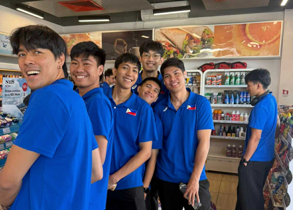 MARCK ESPEJO (sixth from left) and teammates (from left) Bryan Bagunas, Louie Ramirez, Lloyd Josafat, Vince Lorenzo, Peng Taguibolos and Jade Disquitado, who looks undecided as he looks at the rack, get some snacks during a brief stopover in the five-hour bus ride that took them from the city of Piatra Neamt to Romania’s capital Bucharest to take a flight for Portugal during the weekend. [photo credit: PNVF Communications]