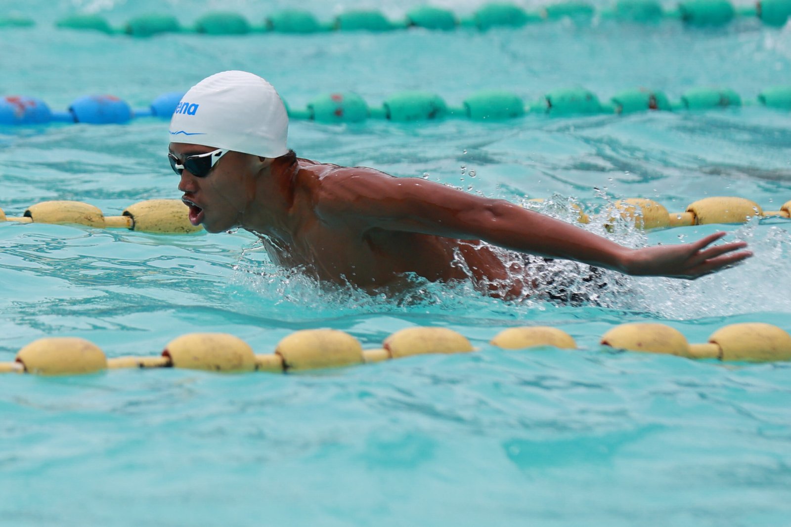 Local standout Christian Isaiah Lagnason competes in the pool in front of his hometown crowd. [PSC photo]