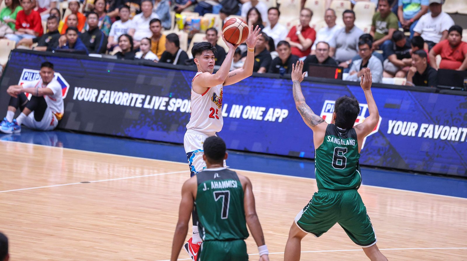 Leonard Santillan rises for a clutch basket during Rain or Shine's win over Terrafirma. [PBA Images]