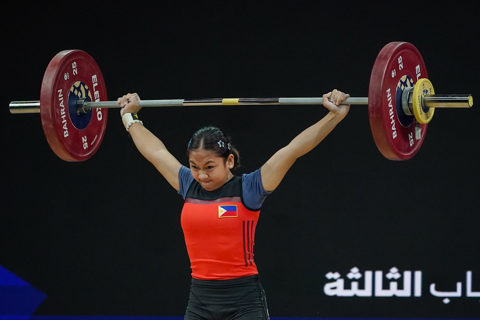 Alexsandra Ann Diaz lifts 92kg to claim bronze in girls’ 48kg weightlifting. [POC photo]