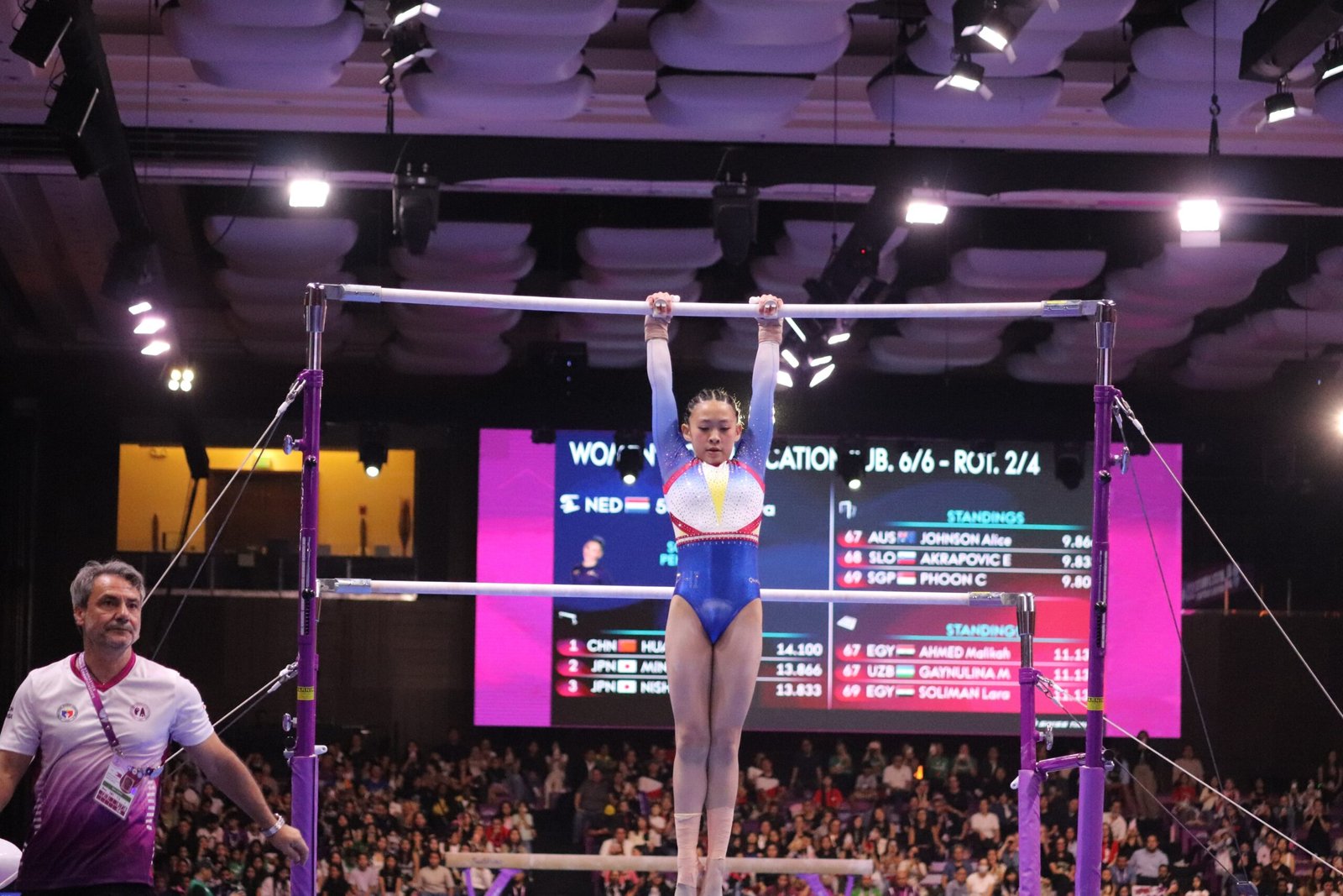 Elisabeth Antone shows fine form on the balance beam of the 3rd FIG Artistic Gymnastics Junior World Championships women's all-around qualifiers last Friday night at the Manila Marriott Grand Ballroom inside the Newport World Resorts in Pasay City. [photo credit: Philippine Sports Commission]