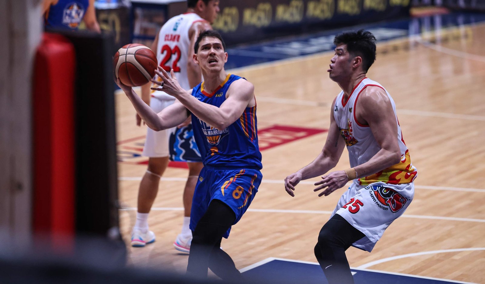 Robert Bolick drives to the basket in NLEX’s win over Rain or Shine in Antipolo. [PBA Images]