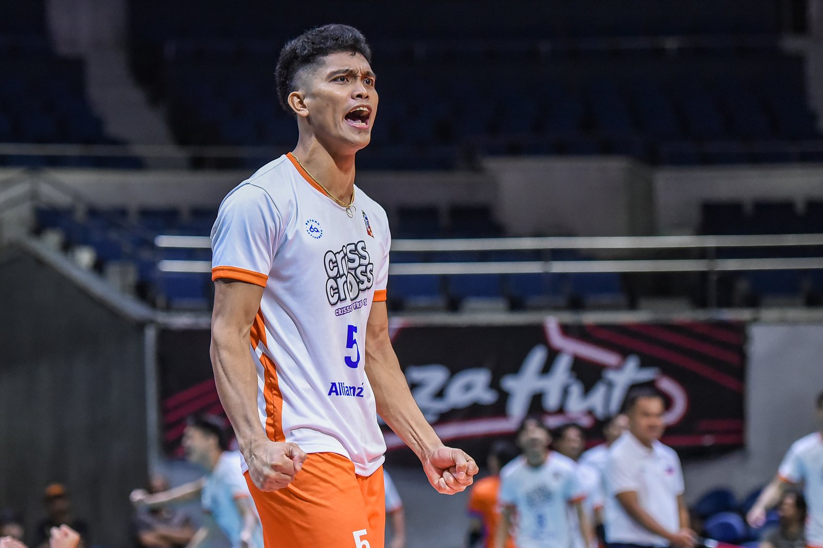 Jude Garcia celebrates a point during Criss Cross’ five-set win against Cignal. [Spikers Turf images]