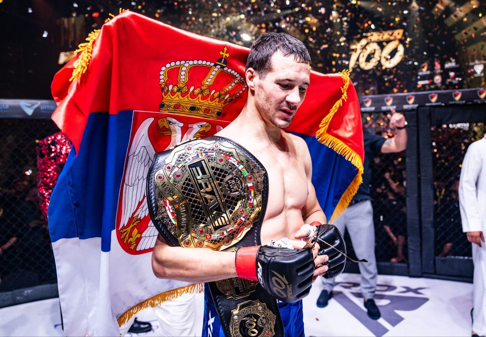 Borislav Nikolić celebrates his bantamweight title defense at BRAVE 100.