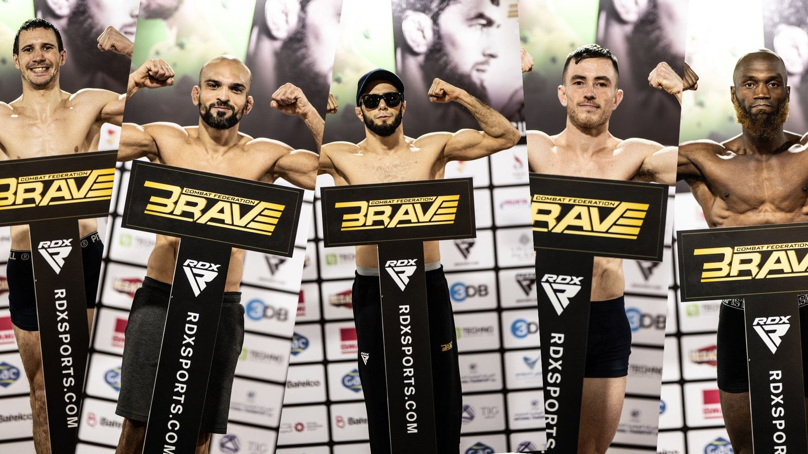 Fighters pose on stage as the historic BRAVE Combat Federation 100 card becomes official.