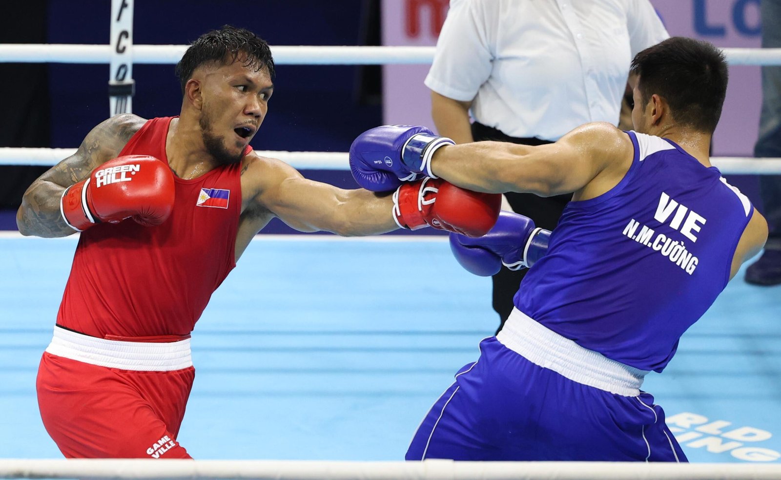 Filipino Olympian Eumir Marcial keeps his SEA Games gold hopes alive with a decisive KO over Nguyen. [POC Media Pool]