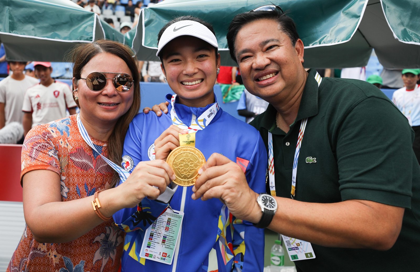 Alex Eala poses with her SEA Games gold medal at the National Tennis Development Center. [POC Media Pool]