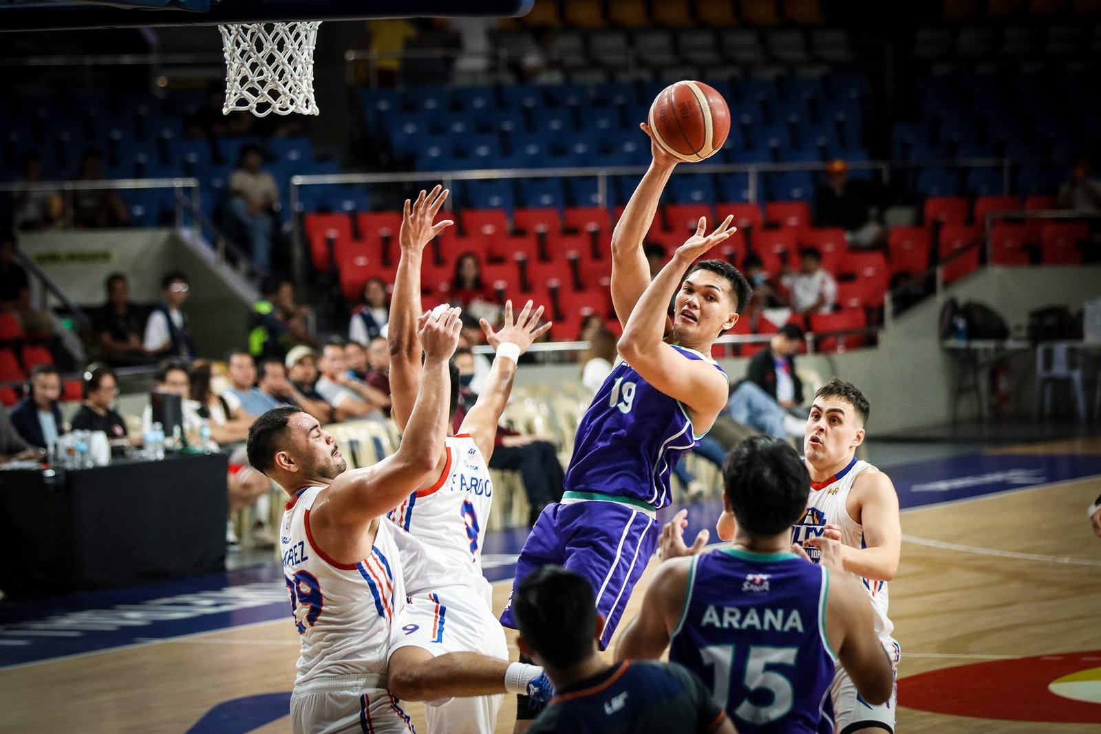 Justine Baltazar powers Converge with 25 points and 24 rebounds in OT win over NLEX. [PBA Images]