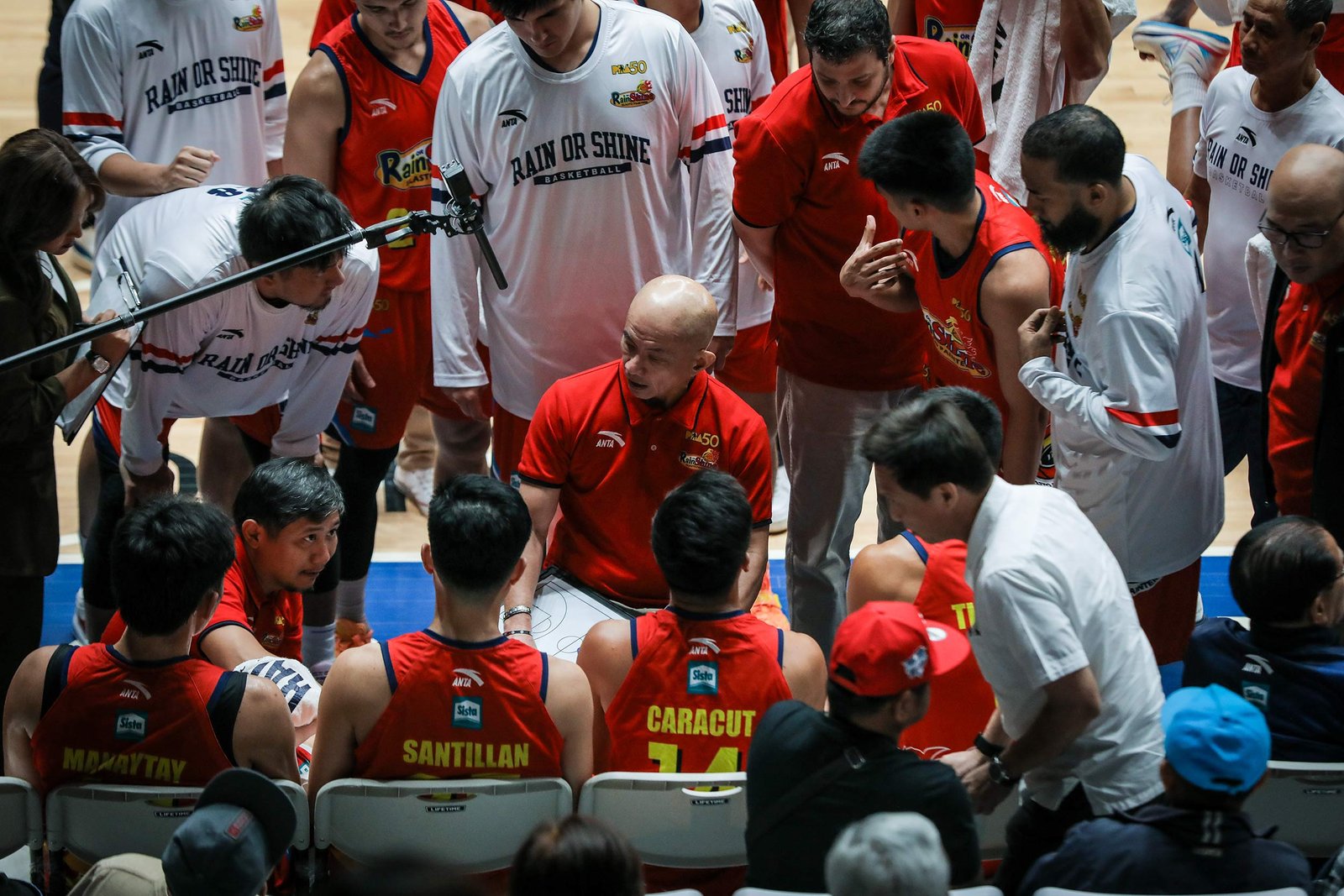 Coach Yeng Guiao gives instructions during a tight PBA Philippine Cup game. [PBA Images]