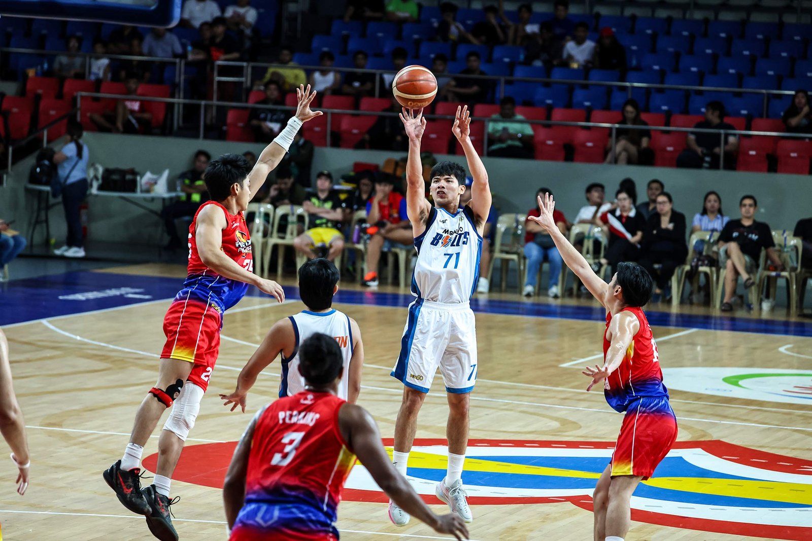 CJ Cansino scores a game-high 22 points to lead Meralco past Phoenix Super LPG, keeping playoff hopes alive. [PBA Images]