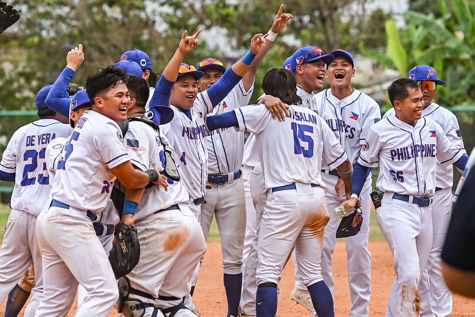Philippine players celebrate their third straight SEA Games baseball gold. [POC Media Pool]