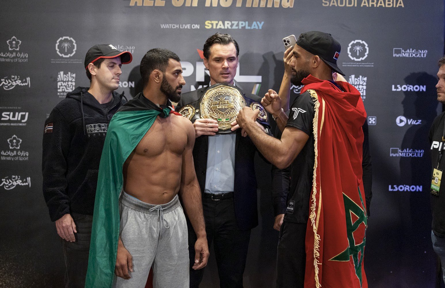 Fighters step onto the scale during the official PFL MENA Finals weigh-ins in Khobar.