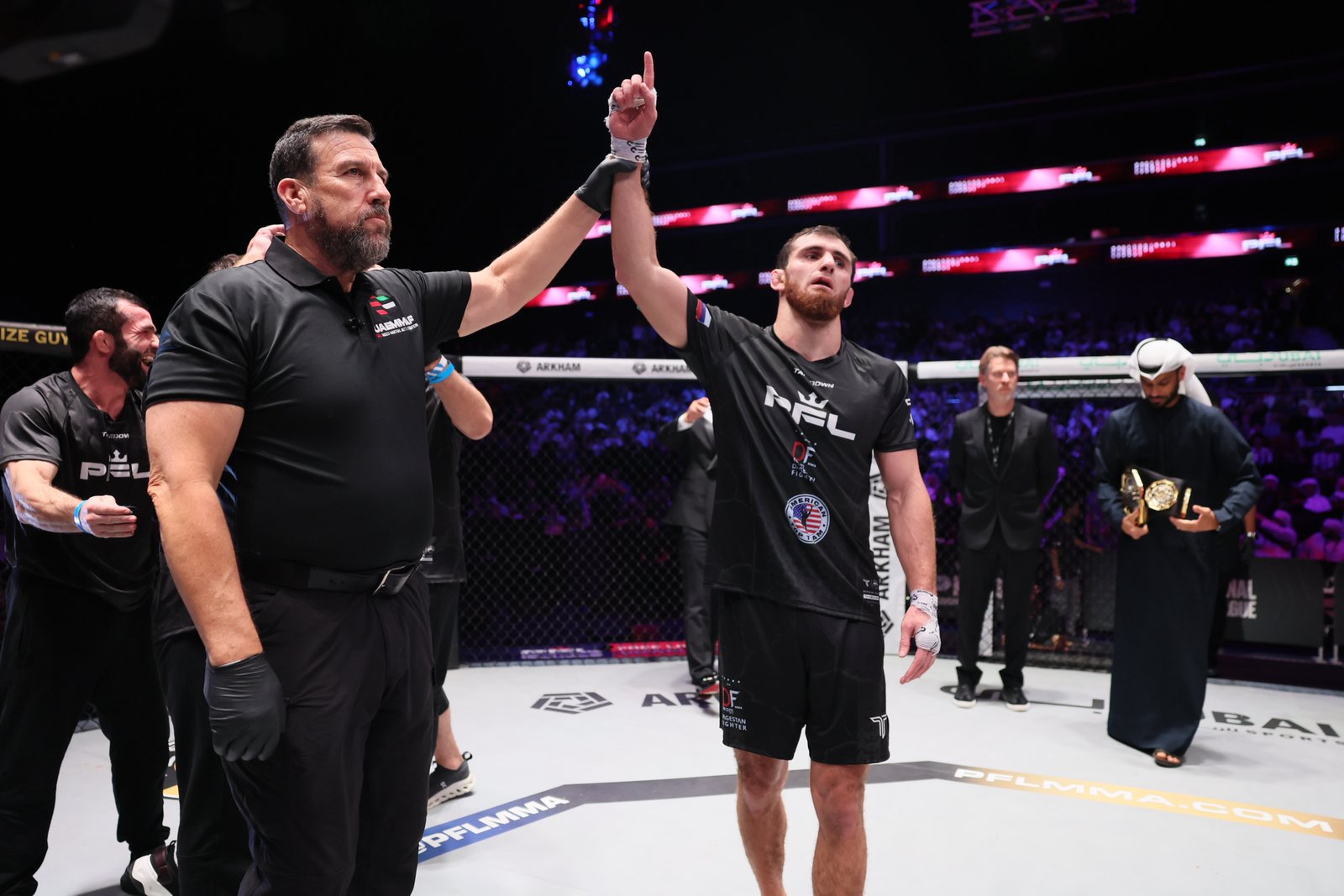 Ramazan Kuramagomedov celebrates after earning a unanimous decision to become welterweight champion. [PFL photo]