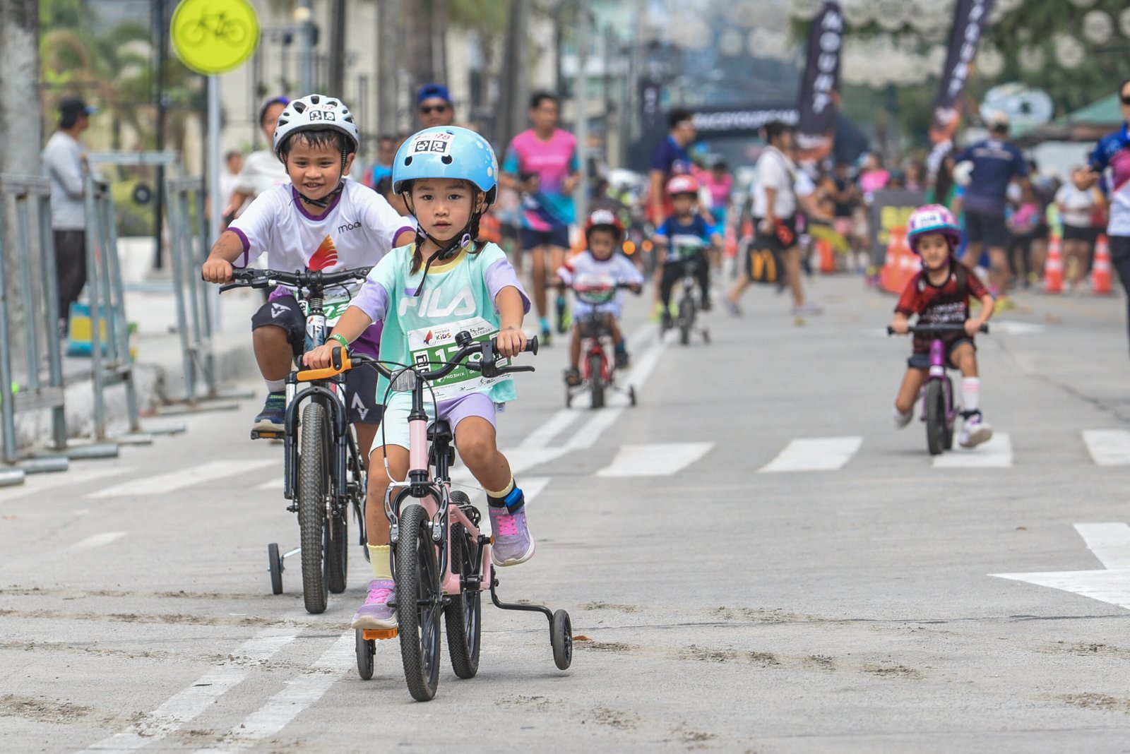 Young participants compete in the Pho3nix Kids Philippines races on the opening day of the festival.