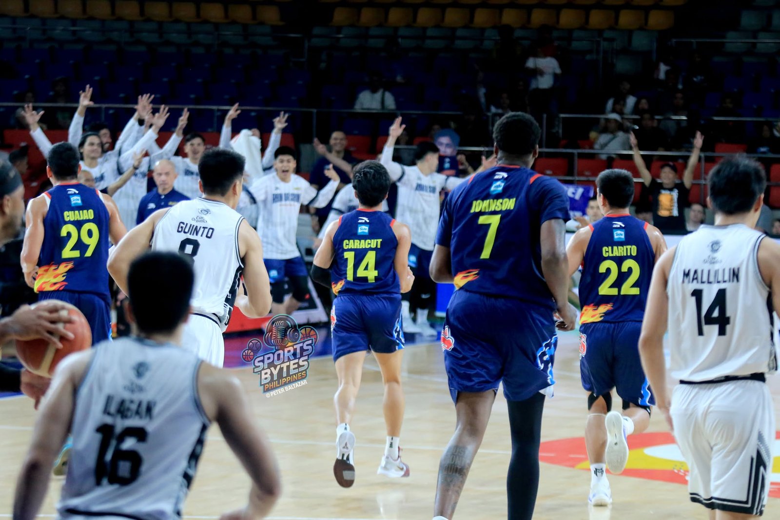 Rain or Shine bench erupts as the record-breaking margin becomes clear late in the game. [photo credit: Peter Baltazar]