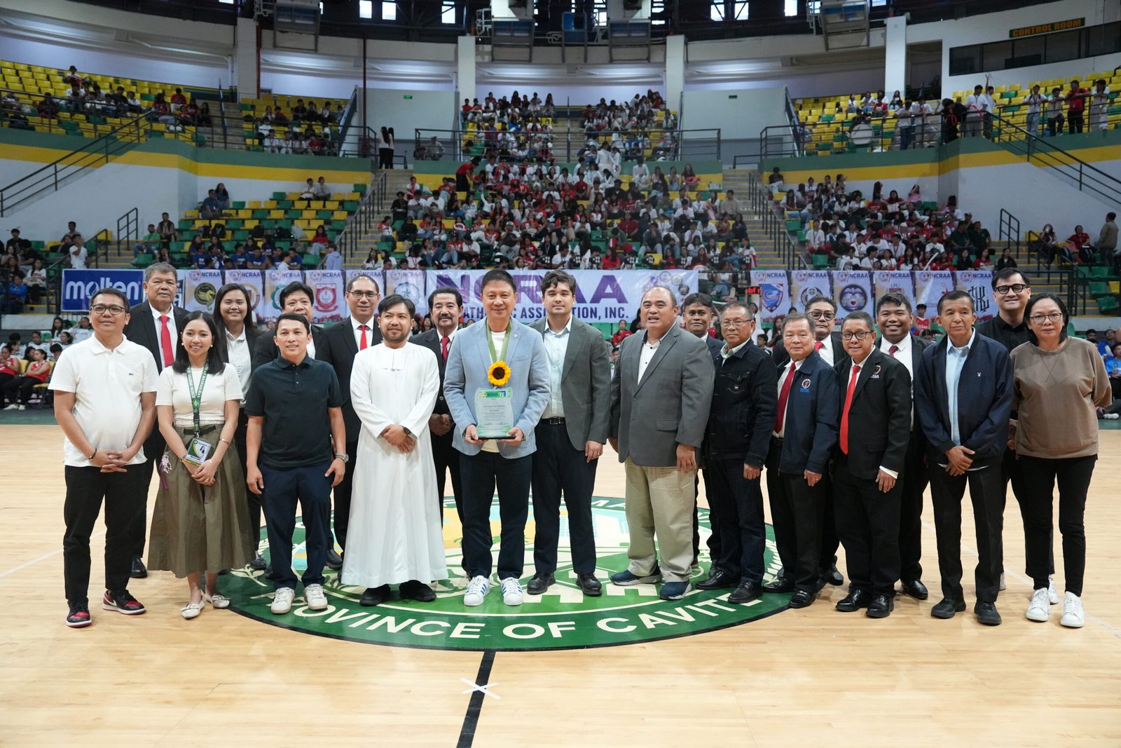 NCRAA officials and athletes gather at the Dasmariñas Arena for the opening of the league’s 32nd season.