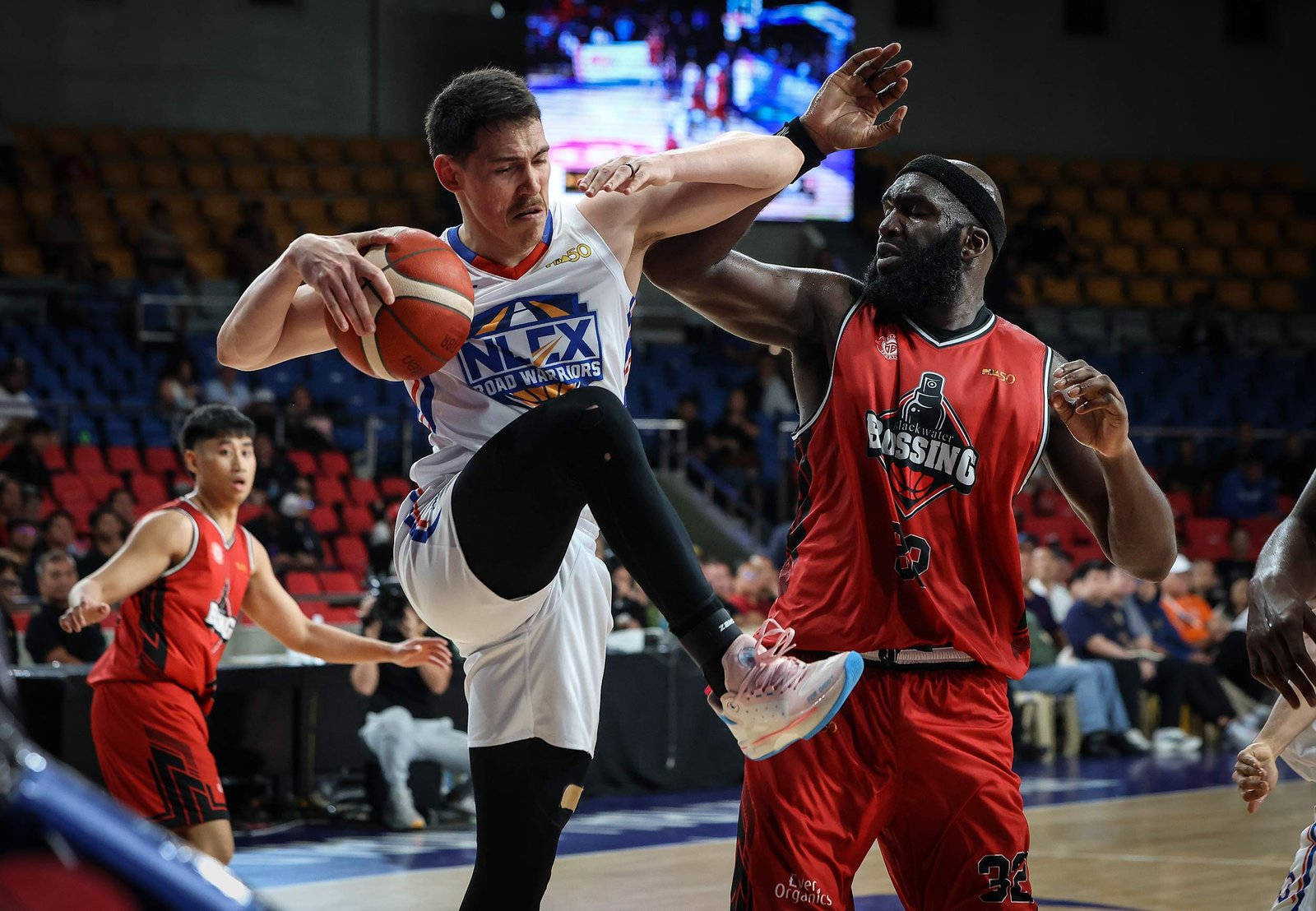 Robert Bolick erupts in the fourth quarter and drills the clutch shot as NLEX escapes Blackwater in a tight Commissioner’s Cup battle. [PBA Images]