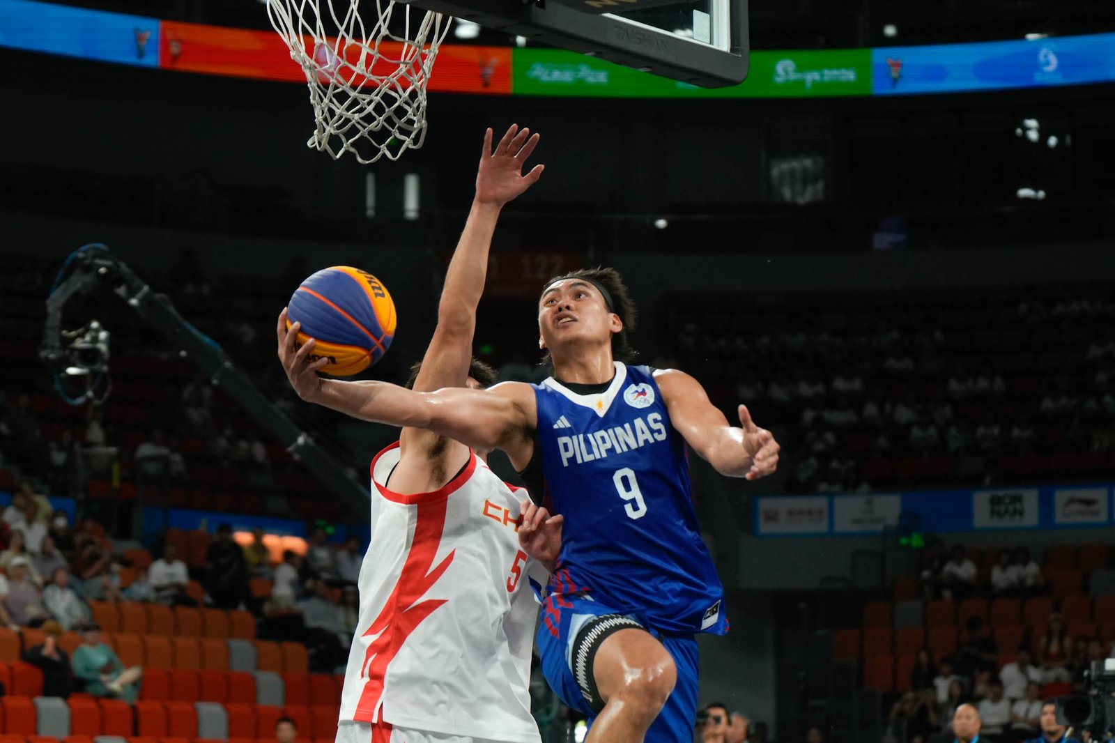 Nic Cabañero delivers in the clutch as Gilas Pilipinas 3x3 edges China in a tight contest. [POC Media pool]