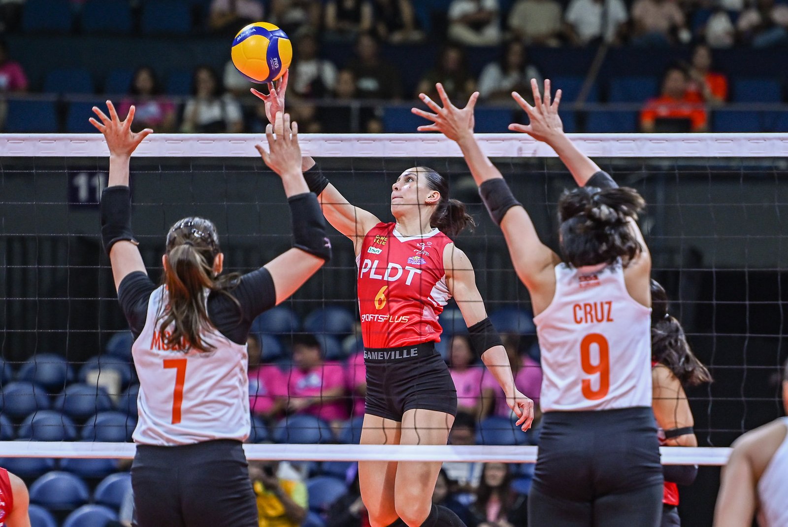 Savi Davison executes a key attack against Farm Fresh. [PVL Images]