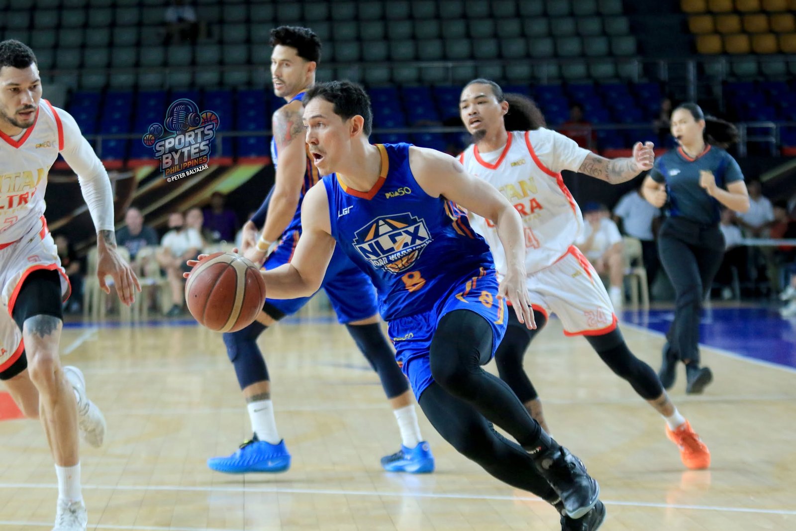 Robert Bolick powers NLEX to overtime win with triple-double. [photo credit: Peter Baltazar]