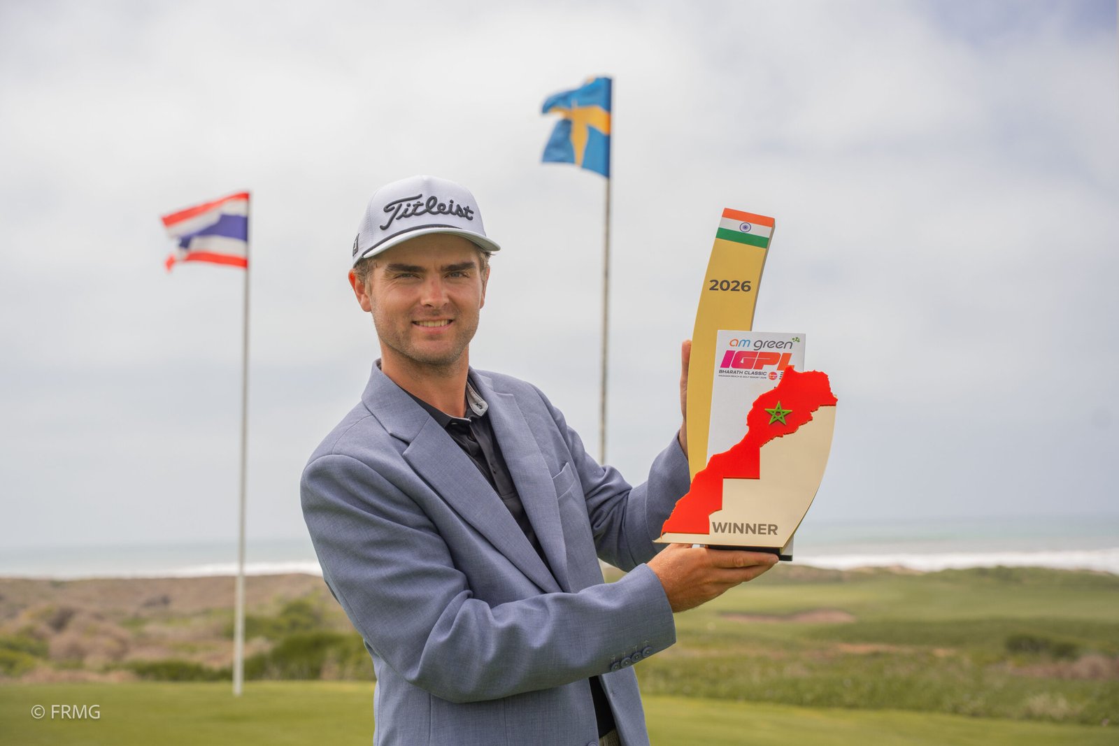 Charlie Lindh celebrates after winning in Morocco [Asian Tour photo]