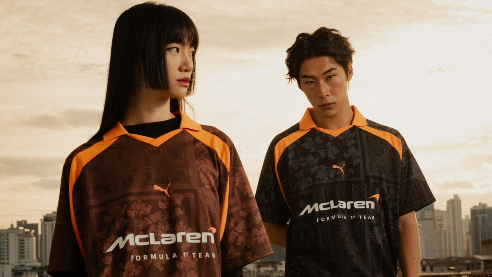 The McLaren jersey features Espresso Brown, Black and signature Papaya Orange details.