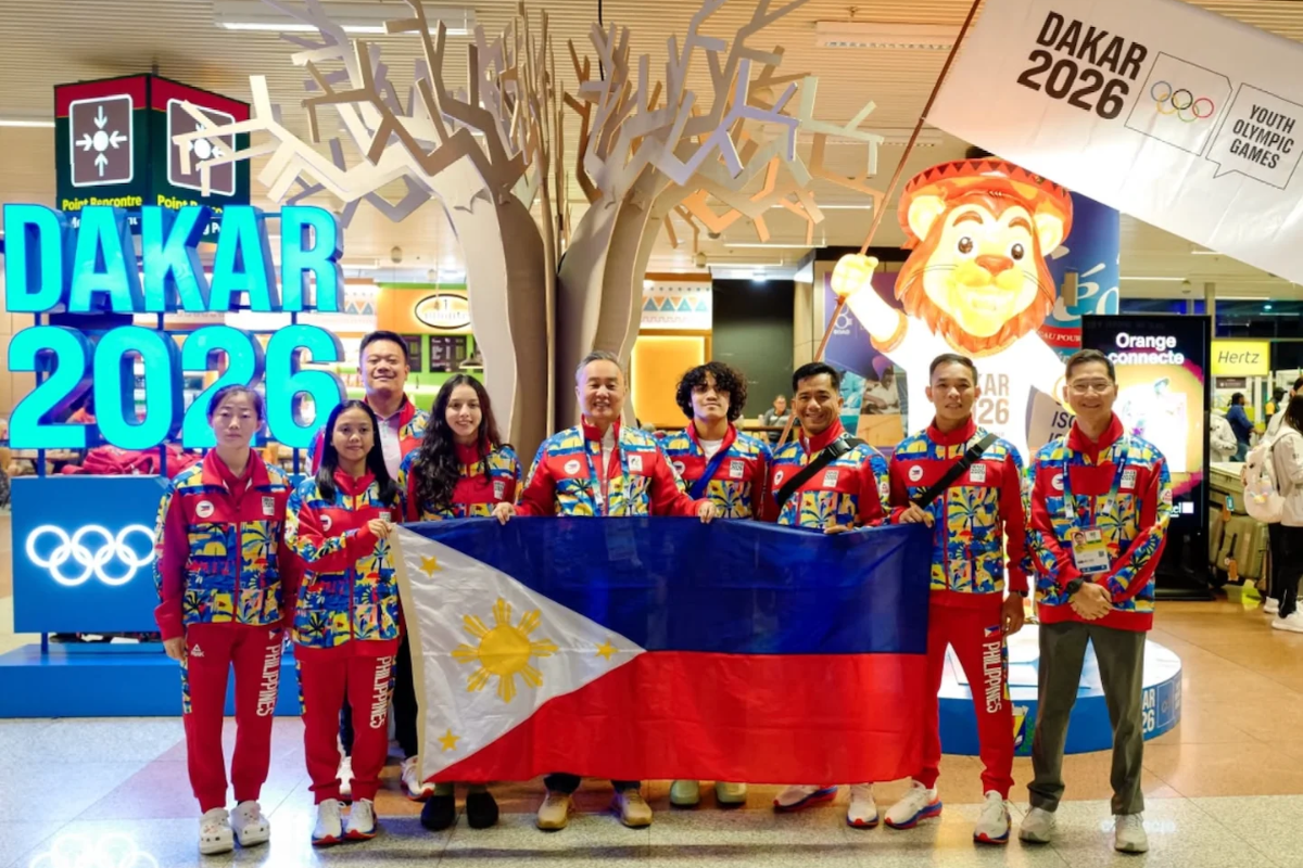 Philippine Olympic Committee President Abraham Tolentino (center), Secretary-General Atty. Wharton Chan (third from left), and Chef de Mission Rocky Samson (right) welcome the first batch of Filipino athletes and coaches upon their arrival at Blaise Diagne International Airport in Senegal on Thursday night. [POC Media Pool]