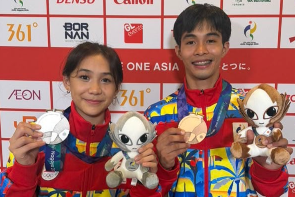 Jeus Gabriel Derick Yape [right] will carry the Philippine flag at the closing ceremony of the Aichi-Nagoya Asian Games on Oct. 4. [POC Media pool]