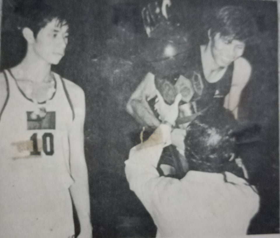 Team skipper Rey Franco accepts the 1972 Asian Youth championship trophy from then-Manila councilor Lito Puyat, who later became BAP president and FIBA president.