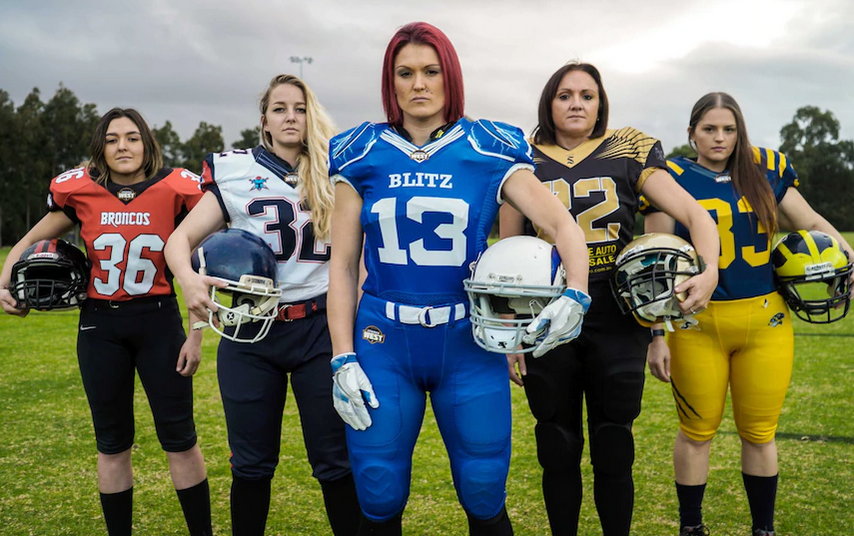 The five team captains in Gridiron West Women's League, with Rhyanna Edbrooke in the centre.(Supplied: Angelo Di Carlo) via www.abc.net.au